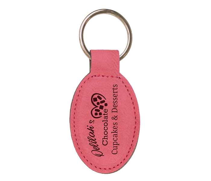 Schlüsselanhänger 75x45mm pink/schwarz